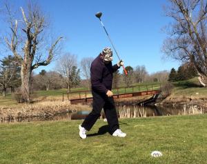 Jerry drives the 2nd (and looks at his divot)