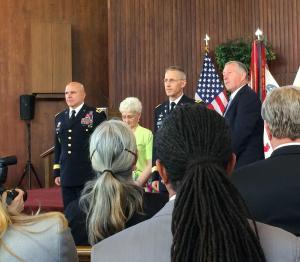 Chaplain Hurley's parents help him put on his General's Stars