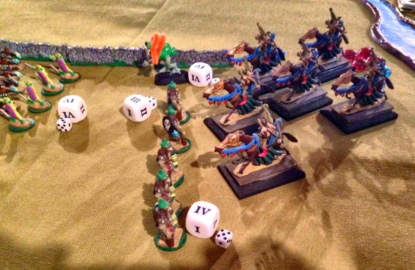 7 Dwarves fight insectmen while elves flank