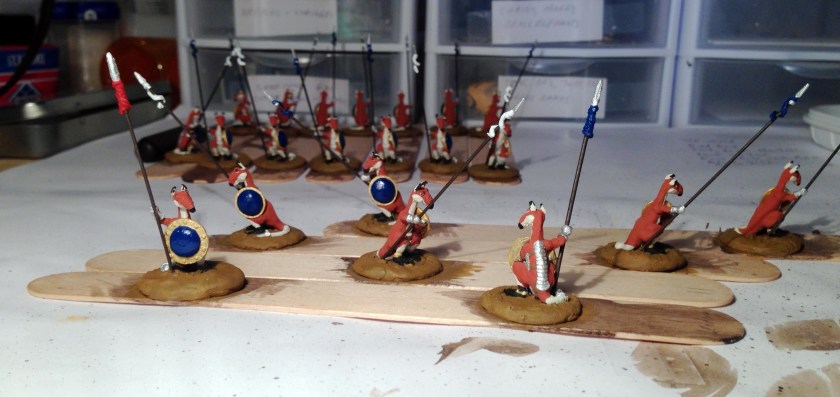 11 Roomans base coated shields with blue