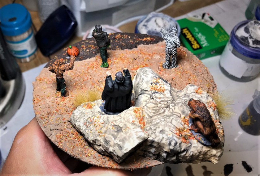 9 figures mounted, rear side